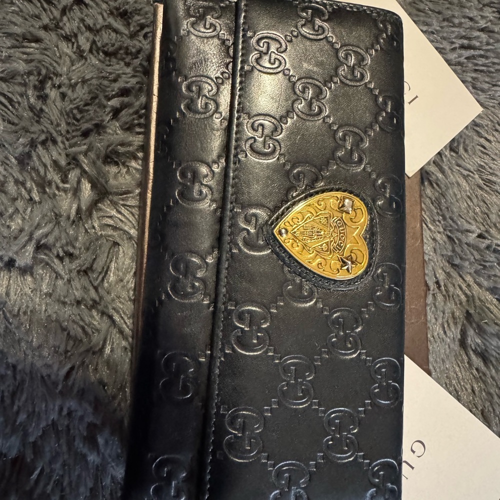Gucci Black Leather Wallet with Gold Emblem